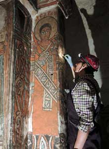Cleaning the wall paintings of Bahera